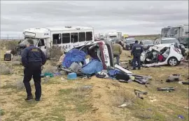  ?? Gina Ferazzi Los Angeles Times ?? THE 2007 Chevrolet Starcraft bus from A&F Tours in Arcadia was traveling east on Highway 58 when it struck a Subaru Outback and a Chevy Spark.