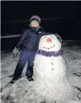  ??  ?? Fun Toby Sneddon (7) from Ferniegair playing in the snow