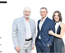  ?? ?? Keepers of the flame: Daniel Craig between Bond producers Michael G Wilson and Barbara Broccoli