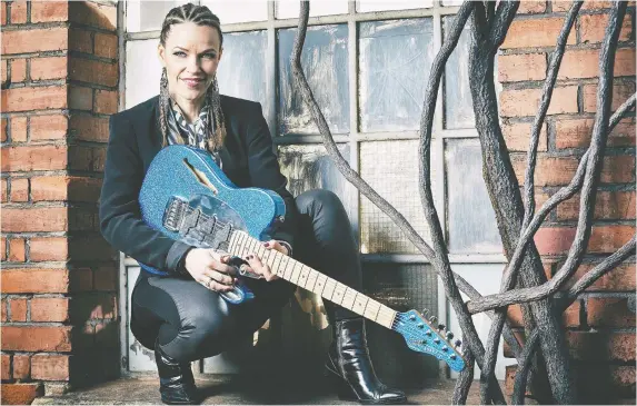  ?? DIRK EIDNER ?? Finnish guitarist Erja Lyytinen isn’t slowing down anytime soon. “I hope I’m able to do good concerts for the next 40 years,” she says. “That’s what I’m aiming for.”