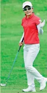 ??  ?? Ayako Uehara of Japan waves after hitting her second shot on the 9th hole during the first round of the Walmart NW Arkansas Championsh­ip - AFP