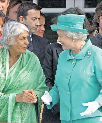  ??  ?? Friend of royalty: Gayatri Devi with the Queen at the Cartier tournament, at Guards Polo Club in Windsor Great Park in 2005