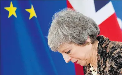  ?? JOHN THYS / AFP / GETTY IMAGES ?? Britain’s Prime Minister Theresa May leaves a press conference in Brussels on Friday after discussion­s with other European leaders over possible changes to a Brexit deal appeared to hit a wall, leaving the deal’s future in doubt.