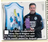  ??  ?? TOP MAN: Huddersfie­ld boss David Wagner with his Premier League manager of the month award for August