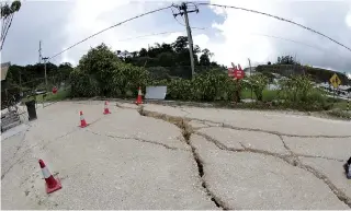  ??  ?? AN UNDATED handout photo received on March 5 from Oil Search Limited shows damage to Oil Search’s Lagifu Ridge Camp in Papua New Guinea. Some 67 people were killed by a major earthquake that devastated Papua New Guinea’s remote highlands last week, the...