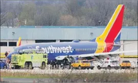  ?? Dominick Reuter AFP/Getty Images ?? A SOUTHWEST AIRLINES f light from New York to Dallas was forced to make an emergency landing in Philadelph­ia. It was “sheer panic,” one passenger said.