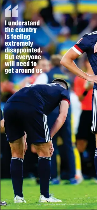  ?? ?? Jack Hendry and his Scotland team-mates cut dejected figures after the defeat to Ukraine during the week