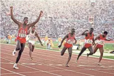  ?? FILE PHOTO BY H. DARR BEISER, USA TODAY SPORTS ?? Carl Lewis, left, won the 100-meter dash in 9.99 seconds, one of four medals he won in the 1984 Olympic Games in Los Angeles.