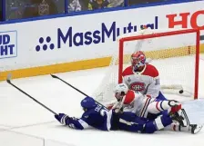  ?? Getty images ?? BEAT THE GOALIE AND THE HORN: Tampa Bay’s Blake Coleman scores from his stomach at 19:58 of the second period to give the Lightning a 2-1 lead over the Canadiens in Game 2 of the Stanley Cup Final on Wednesday night. The Lightning won 3-1 to take a 2-0 series lead. Game 3 is Friday in Montreal.