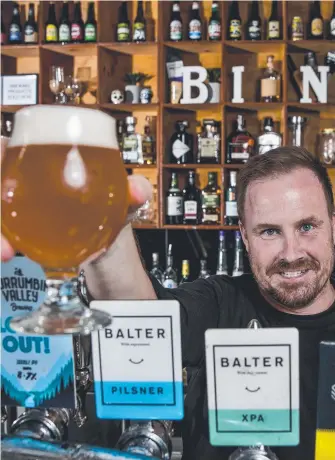  ?? Picture: JERAD WILLIAMS ?? Bine Beer Bar owner Scott Imlach with a glass of something crafty.