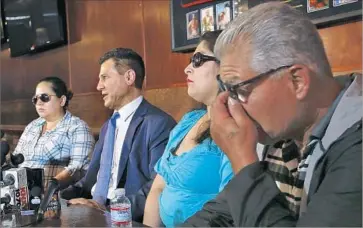  ?? Photograph­s by Mel Melcon Los Angeles Times ?? FERMIN VINCENT VALENZUELA’S ex-wife, Patricia Gonzelez, left, his sister, Andrea Valenzuela, and his father, Fermin Sr., speak at a news conference with the family’s attorney, Garo Mardirossi­an, second from left.