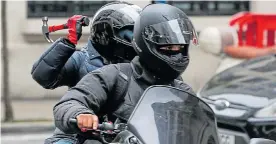  ??  ?? Street terror...moped thugs carrying weapons are fuelling a crime rise