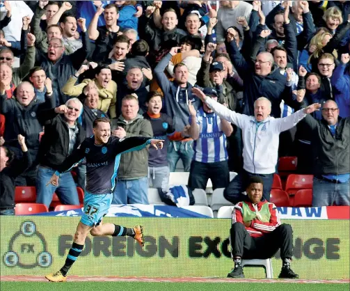  ??  ?? BIG MAC: Sheffield Wednesday midfielder Aiden McGeady celebrates his goal