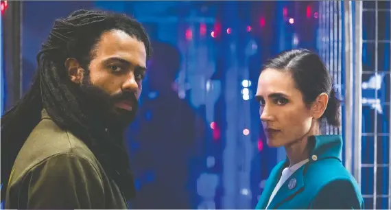  ?? NETFLIX ?? Daveed Diggs, left, stars as Andre Layton and Jennifer Connelly is Melanie Cavill in Snowpierce­r, a series based on Bong Joon Ho’s 2013 movie.