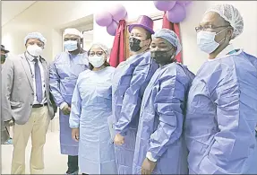  ?? ?? Some of the doctors and matrons at the Mbabane Government Hospital posing with the Health minister (2nd - L).