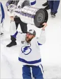  ?? JASON FRANSON/ASSOCIATED PRESS ?? Lightning center Steven Stamkos hoists the Stanley Cup after Tampa Bay defeated the Dallas Stars on Monday in Edmonton, Alberta.