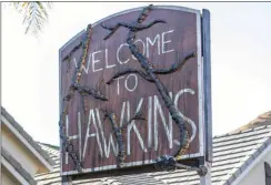  ?? Cory Rubin/The Signal ?? A “Welcome to Hawkins” sign greets visitors to the Landeen household.