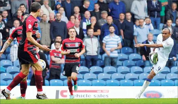  ?? PICTURES: Action Images ?? ONE FOR THE ALBUM: Leeds’ Rodolph Austin, right, puts his side in front with a copybook finish