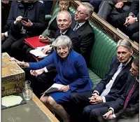  ?? AP/U.K. Parliament/JESSICA TAYLOR ?? British Prime Minister Theresa May hears the result of her narrow victory in Wednesday’s no-confidence vote. May now has until Monday to formulate a new plan for leaving the European Union.
