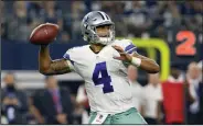  ?? AP PHOTO ?? Dallas Cowboys quarterbac­k Dak Prescott throws a pass against the Chicago Bears.