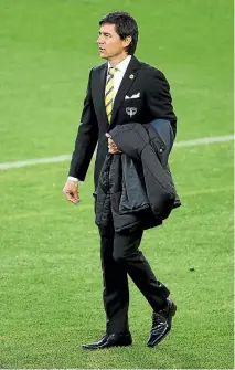  ?? PHOTOS: GETTY IMAGES ?? Chris Greenacre, left, steps in as interim Wellington Phoenix coach again as Darije Kalezic, right, departs.