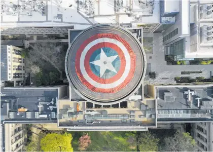  ?? Photo / AP ?? Massachuse­tts Institute of Technology's Great Dome was draped with a cloth version of Captain America's shield. MIT students have focused similar pranks on the dome, this time with Avengers: Endgame on their minds.