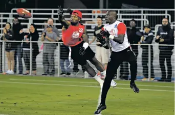  ?? MARCIO JOSE SANCHEZ/THE ASSOCIATED PRESS ?? Omar Bolden, left, breaks up a pass Tuesday intended for Team Vick’s Chad Ochocinco during a flag football exhibition in San Jose, Calif.