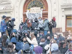  ?? REUTERS ?? High school students block the access to Lycee Turgot in Paris during a nationwide day of strike against French government’s pension reform plan yesterday.