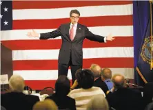  ?? Jim Cole / Associated Press ?? Ex- Texas Gov. Rick Perry at a GOP leadership summit in Nashua, N. H., April 17, is set to attend the Las Vegas event.