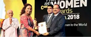  ??  ?? Vidumini Ranasinghe receiving the award