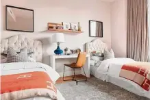  ?? Photos by Scott Gabriel Morris/tns ?? Bright orange throws are paired with an electric blue table lamp for a burst of unexpected color.