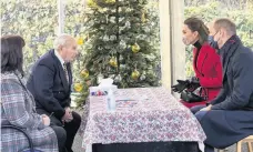  ??  ?? The Duke and Duchess of Cambridge chat with resident Ted Hogg and staff member Lorraine Perdicchia at Cleeve Court