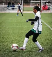  ?? Michael Minasi ?? College Park’s Kayla Fowler (12) controls the ball during the Cavs and Cleats Classic girls soccer tournament against Cy-Ridge on Jan. 18 at the Gosling Sports Complex in The Woodlands.