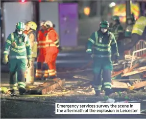  ??  ?? Emergency services survey the scene in the aftermath of the explosion in Leicester