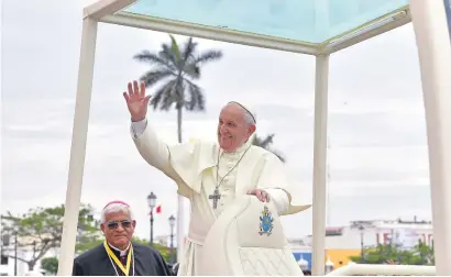  ?? Picture: AFP ?? PEACE BE WITH YOU. Pope Francis waves to the crowd at an open-air mass outside the Cathedral of Trujillo in Peru on Saturday.