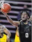  ?? Julio Cortez The Associated Perss ?? Forward Aaron Henry and Michigan State lost at Maryland on Sunday but still have a shot at making the NCAA Tournament.