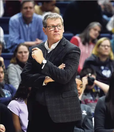  ?? Stephen Dunn / Associated Press ?? UConn head coach Geno Auriemma watches his team during the second half against Tulsa in January in Storrs.