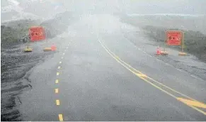  ??  ?? Flooding closed the Milford Road yesterday trapping tourists.