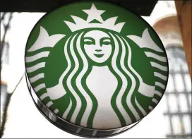  ?? GENE J. PUSKAR / ASSOCIATED PRESS ?? In an effort to rid its stores of plastic straws, Starbucks will begin a process of switching all of its cold beverage lids to the styles used on the coffee chain’s nitro coldbrew beverages.