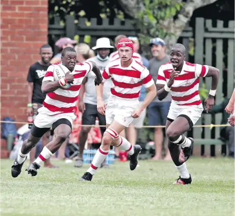  ?? ?? Michaelhou­se 1st XV throwing their heart and soul into the game against Glenwood.