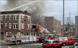  ?? COURTESY OF BEN HASTY ?? The scene at Penn Avenue and South Second Avenue in West Reading after an explosion at the R.M. Palmer Co. chocolate plant March 24. Two lawmakers who represent Berks County in Congress are looking to eliminate the kind of piping that investigat­ors say led to the blast.