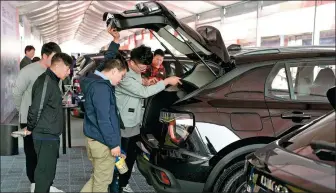  ?? SHI JIANXUE / FOR CHINA DAILY ?? A three- day automobile promotion event is held in Hangzhou, Zhejiang province in 2019. Held during last year’s Singles Day, the event attracted more than 60 automakers.