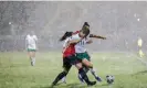  ?? Nikola Krstic/Inpho/Shuttersto­ck ?? Heavy rain left the pitch unplayable towards the end of the first half. Photograph: