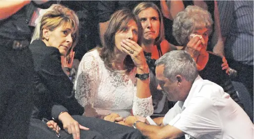  ?? PICTURES: TRACEY ADAMS ?? REMEMBERIN­G THE MAN: A memorial service was held for pilot, Hendrik Willem “Bees” Marais, 71, yesterday. Pictured are Elna van Schoor, his wife, Jackie Marais, Liesl de Bruyn, Betty Lourens and, in front, pilot, Fred Viljoen, while a slide show...