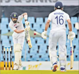  ?? AP ?? KL Rahul (left) and Mayank Agarwal stitched together an opening stand of 117 on Day 1 of the first Test against South Africa at the Supersport Park at Centurion on Sunday. It was India’s third hundred-run opening stand in South Africa.