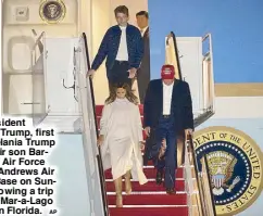  ?? AP ?? US President Donald Trump, first lady Melania Trump and their son Barron exit Air Force One at Andrews Air Force Base on Sunday following a trip to their Mar-a-Lago estate in Florida.