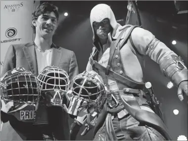  ?? DAVE SIDAWAY/ THE GAZETTE ?? Carey Price has teamed up with Ubisoft to create Assassin’s Creed III-themed masks that are to be auctioned for charity.