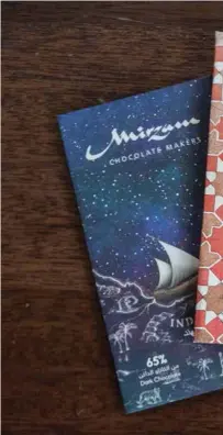  ?? Antonie Robertson / The National ?? Mirzam’s chocolates, made with dates and date syrup, have won awards from the Academy of Chocolate in London. Kathy Johnston, a partner at Mirzam, is chief chocolate officer, below