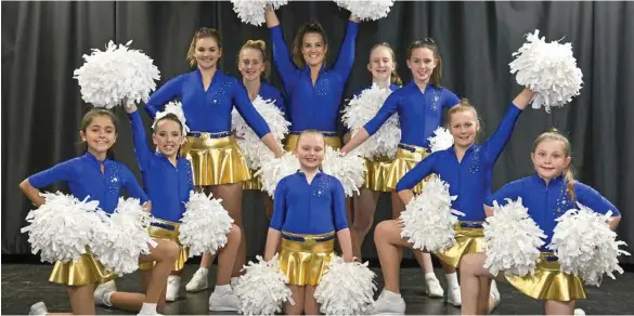  ?? PHOTO: KEVIN FARMER ?? SHAKE IT: Looking forward to strutting their stuff at ANZ Stadium tonight are Toowoomba City Cheerleade­rs (from left) Inara Draper, Zahnee Walters, Chloe Single, Kaylee Keehn, Chelsey Fien, Emilee Keehn, Taya Auld, Anna Cairns, Arabella Smith and...