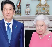  ?? ?? Condolence­s: The Queen meets Mr Abe in 2016